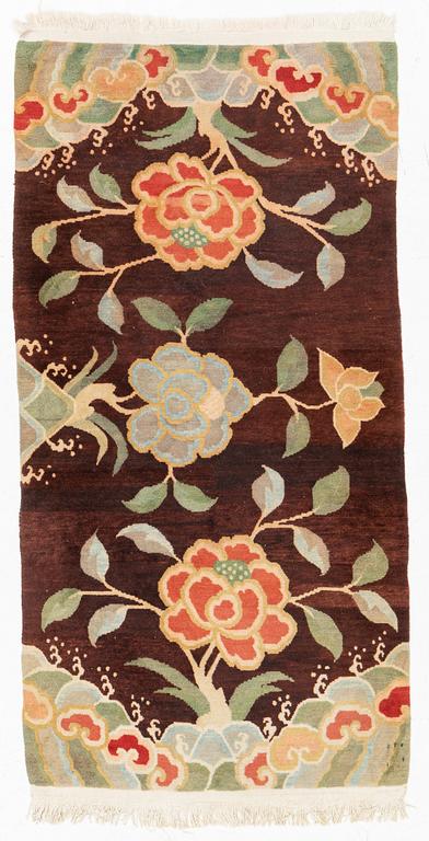 A rug, China, circa 176 x 92 cm.