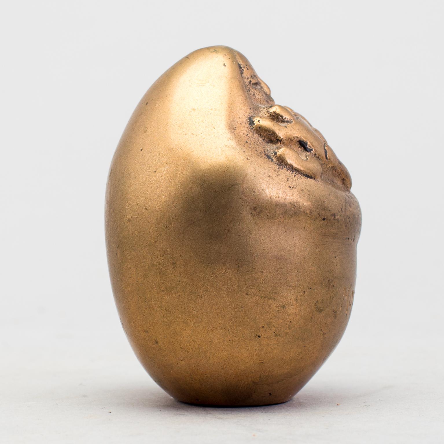 DAVID WRETLING, skulptur, patinerad mässing, "Moder Jord", signerad och daterad 1969.