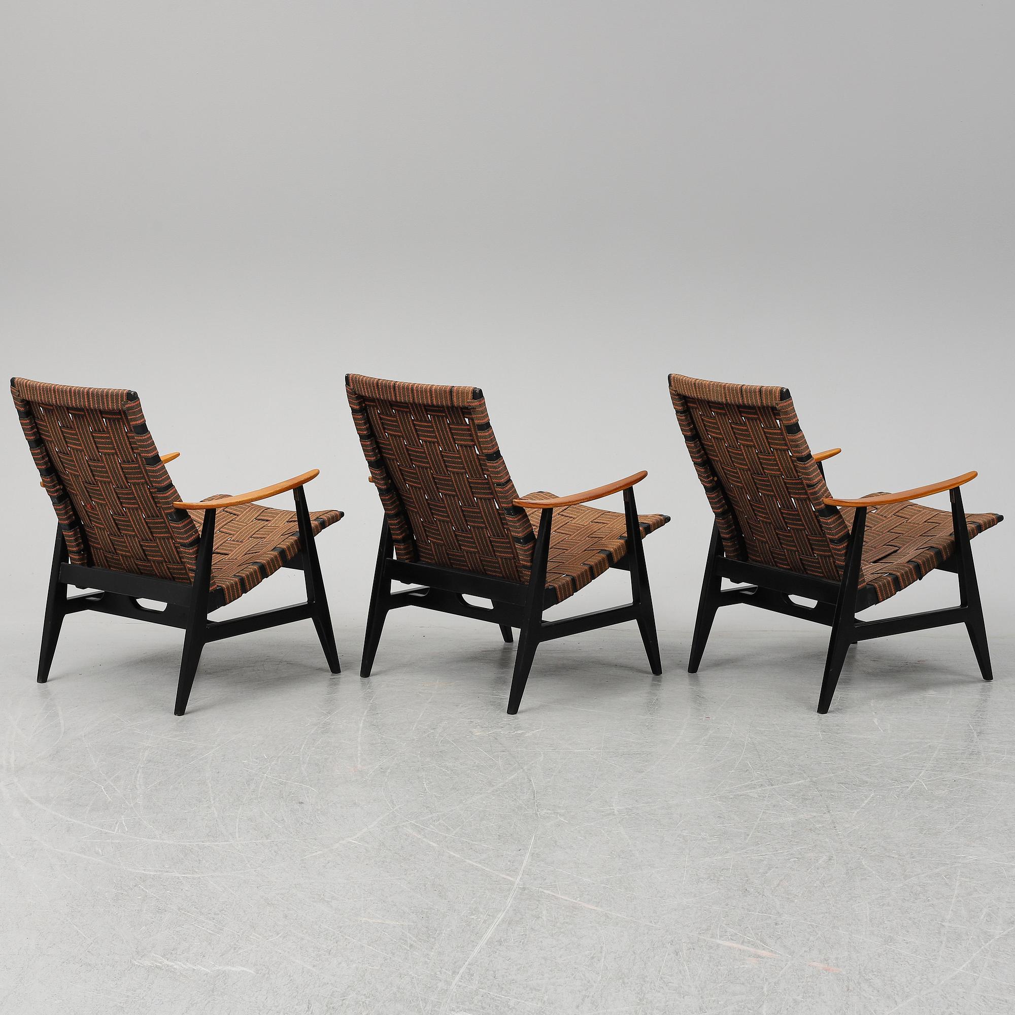 A set of three 1950's easy chairs.
