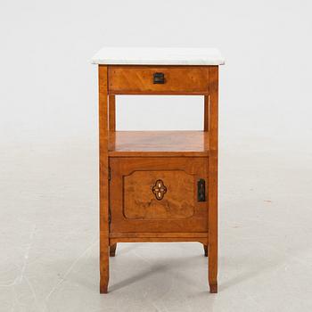 Bedside table with marble top, 20th century.