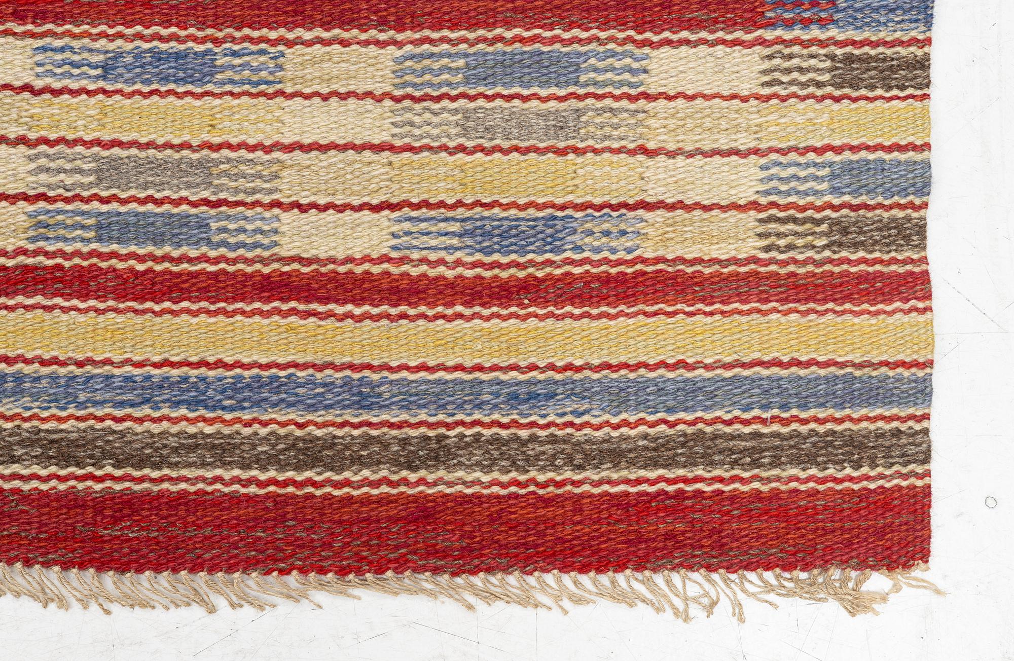 A flat weave carpet, c. 256 x 158 cm.