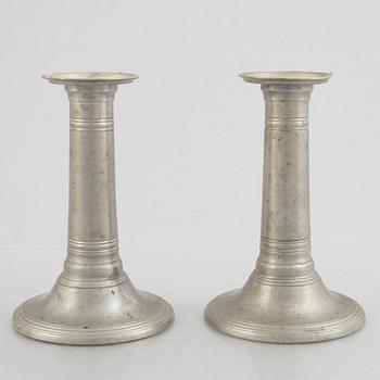 A pair of pewter candle sticks, model A702, Firma Svenskt Tenn, Sweden, 1928.