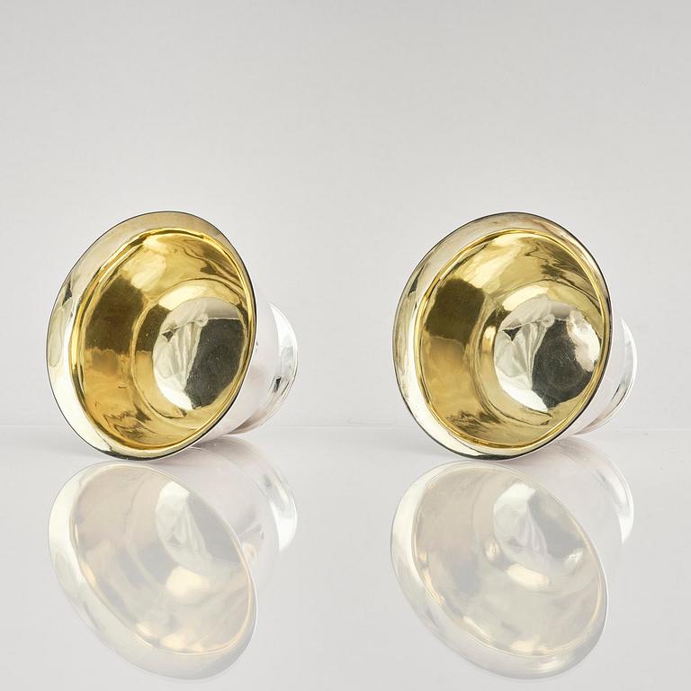 A pair of Swedish parcel-gilt silver dessert bowls with stand, mark of Gustaf Möllenborg, Stockholm 1830.