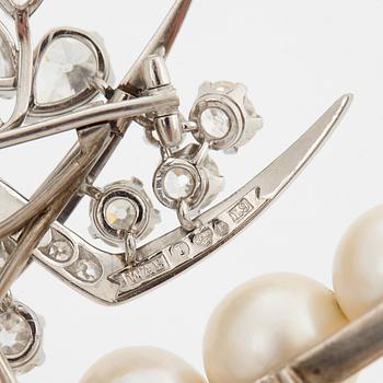 A tiara with cultured pearls and a detachable WA Bolin platinum brooch set with old-cut diamonds.