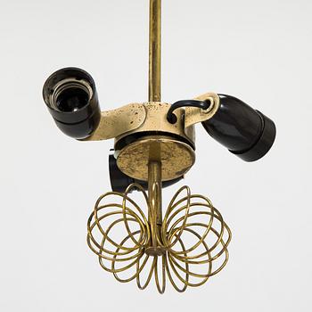 Paavo Tynell, a mid-20th century ceiling light for Taito, Finland.