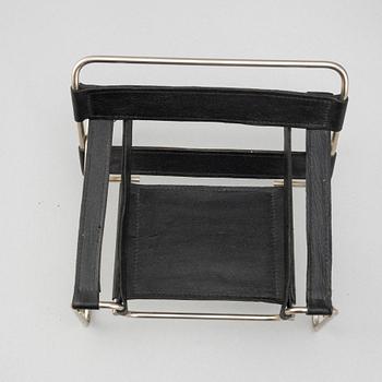 Miniatures of three famous design chairs, 21st century.