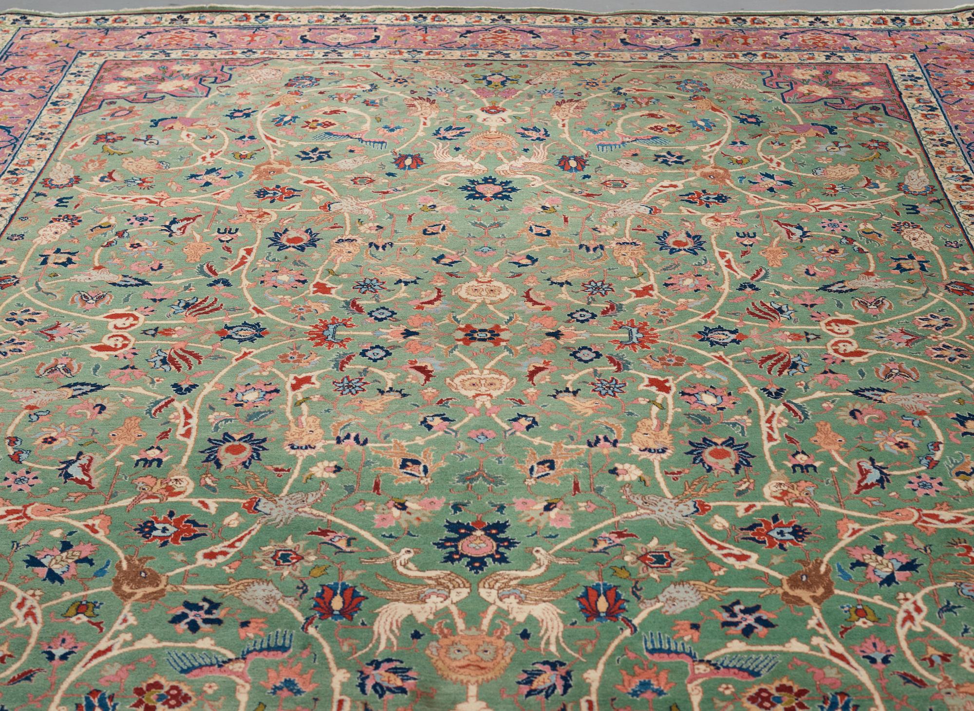 A carpet, a semi-antique Tabriz, ca 374-376,5 x 268-276 cm.