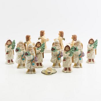 A collection of angels and an advent candlestick, 14 pieces, 20th century.