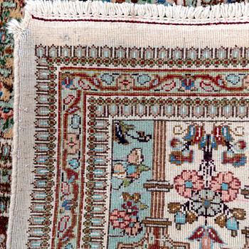 A semiantique signed Tabris carpet ca 364x262 cm.