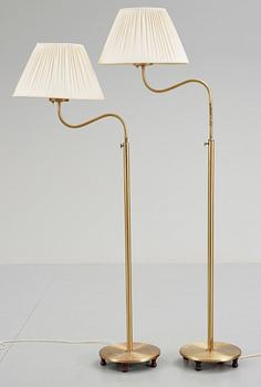 Two Josef Frank brass floor lamps, Svenskt Tenn, model 2568.