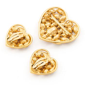 Yves Saint Laurent, earrings and brooch.