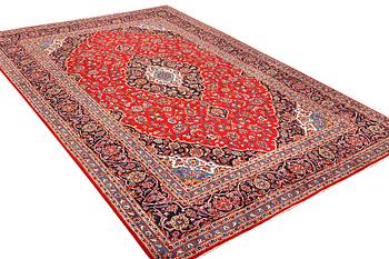 A Keshan carpet, c. 380 x 255 cm.