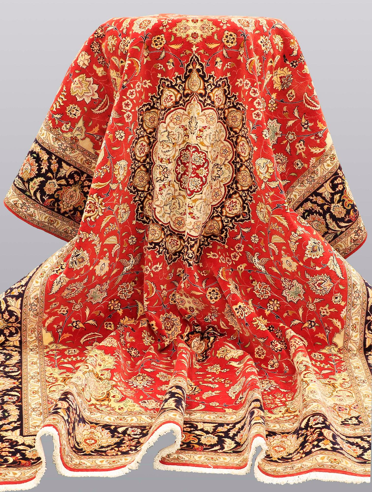 A carpet, Täbriz part silk, 341 x 248 cm.