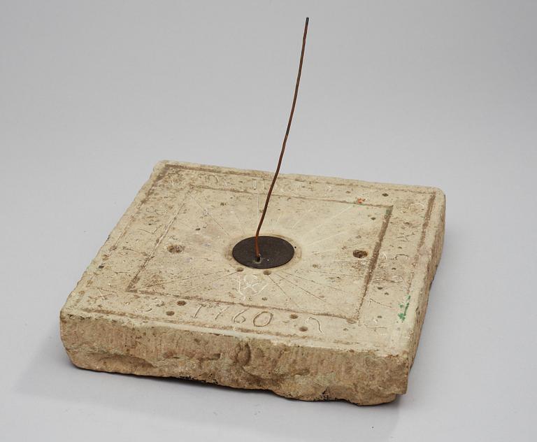 An 18th century lime stone sundial.