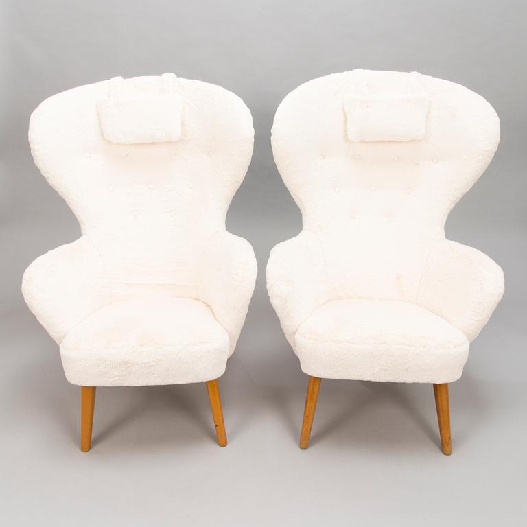 CARL GUSTAF HIORT AF ORNÄS, Two mid-20th century 'Siesta' armchairs for för Puunveisto Oy - Träsnideri Ab.