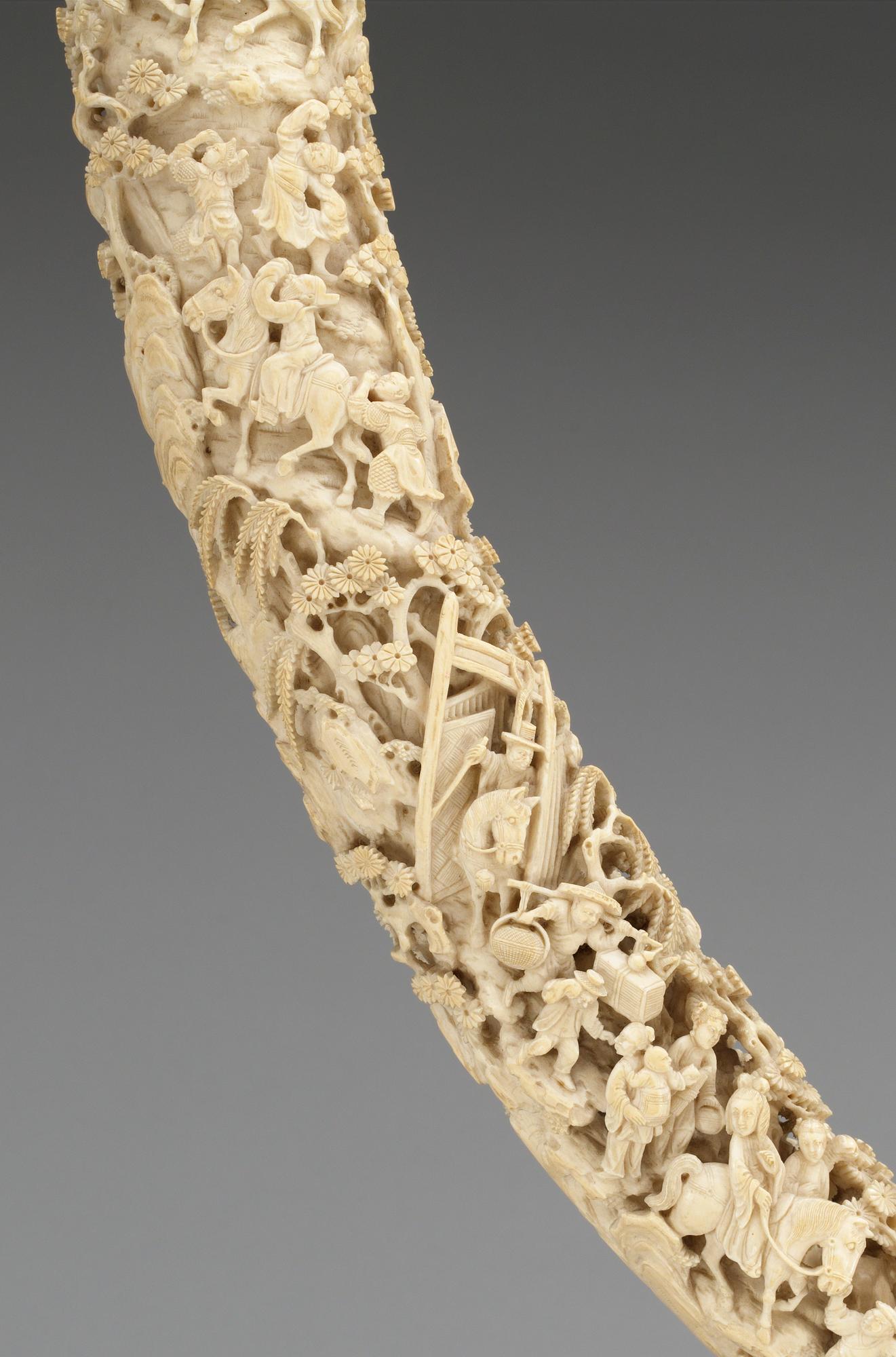 A finely carved ivory tusk, Qing dynasty, 19th Century.