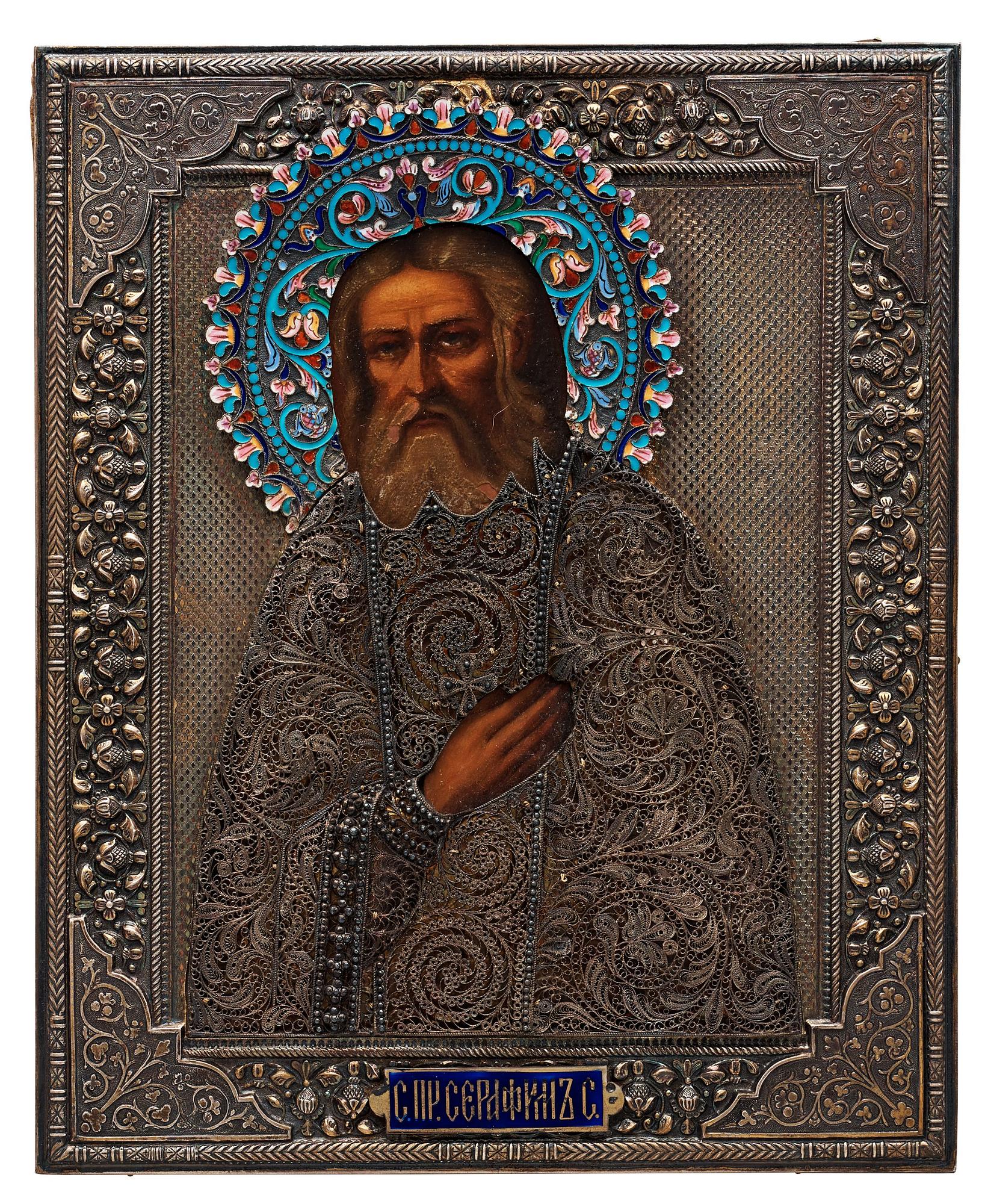 A Russin early 20th century parcel-gilt and enamel icon, unidentified makers mark S.G., Moscow 1899-1908.