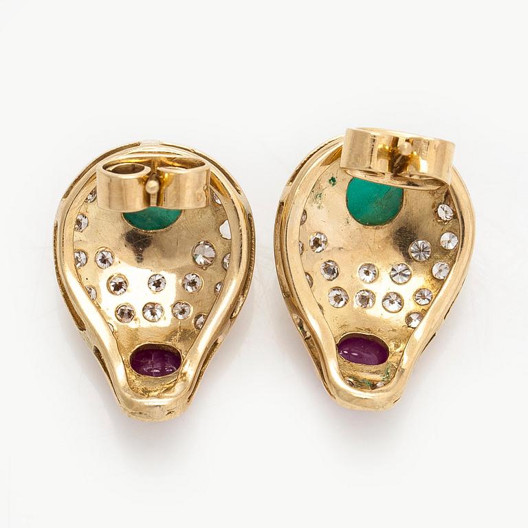 A pair of ca. 18K gold earrings, set with cabochon-cut emeralds and rubies, and brilliant-cut diamonds.