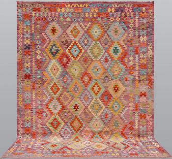A kilim carpet, ca 345 x 246 cm.