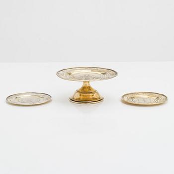 Three 19th-century gilt silver paten, two by master Dmitry Maksimovich Shelaputin, Moscow, 1876-77.