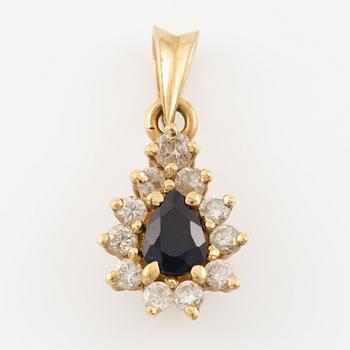 Pendant, 18K gold, set with a sapphire and brilliant-cut diamonds.