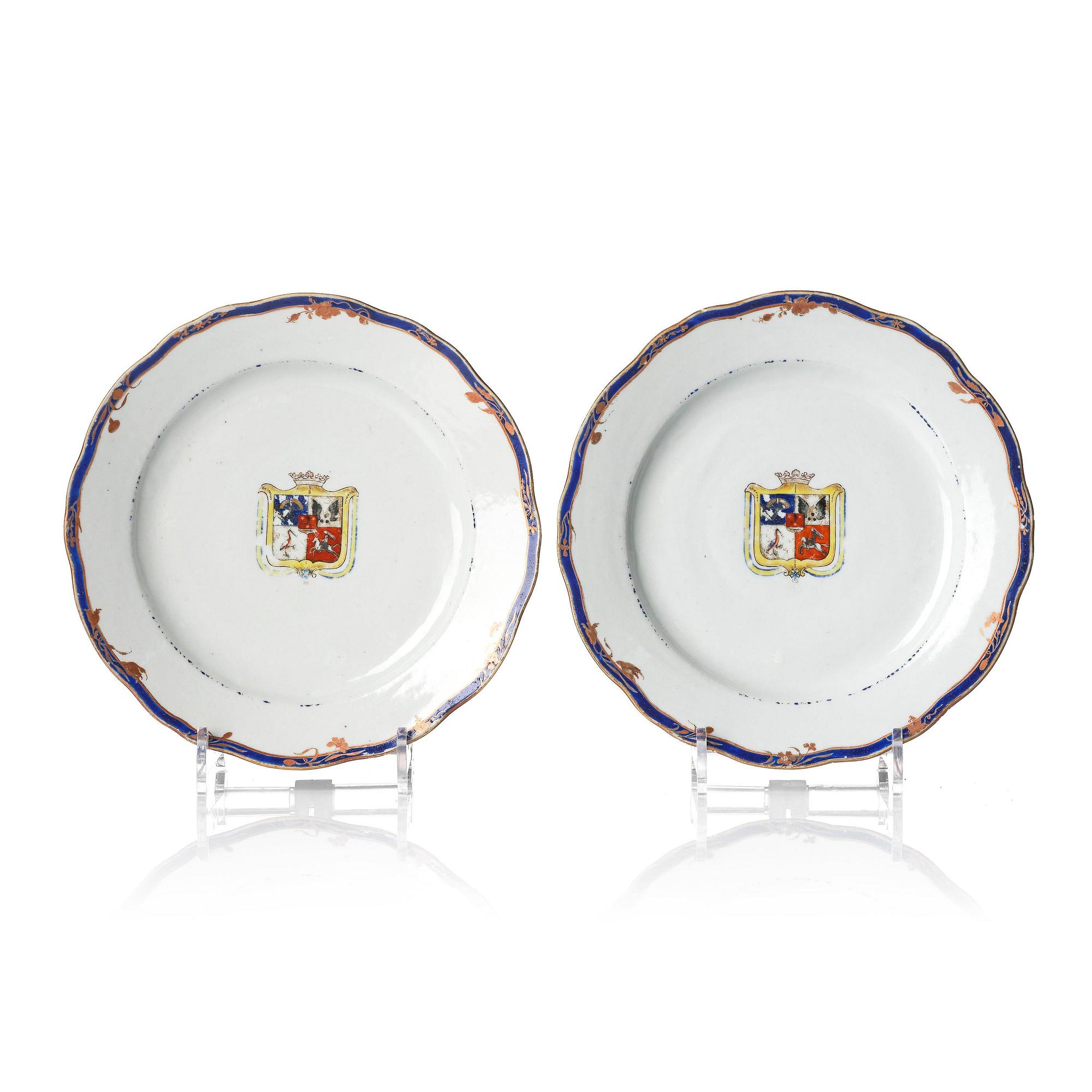 A pair of 'Chinese Export' armorial dinner plates, Qing dynasty, 1790's.