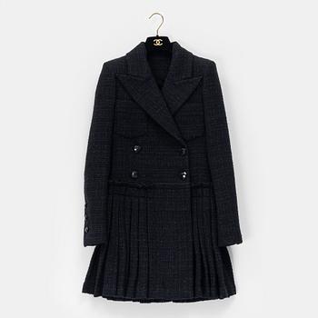 Chanel, a bouclé coat, size 34.