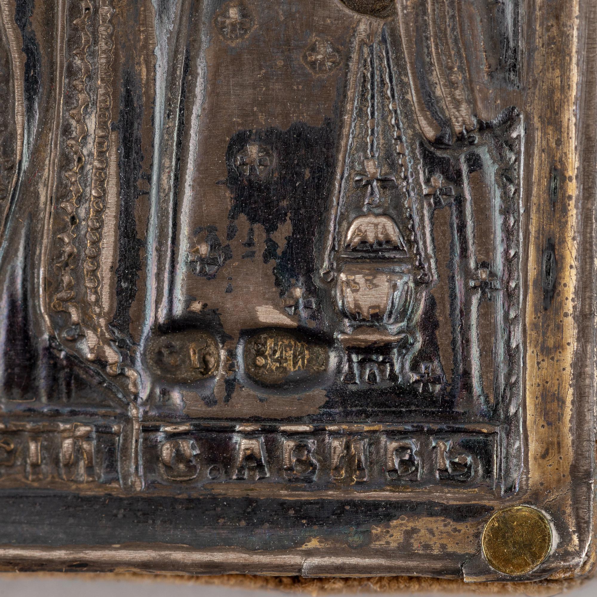 Two Russian 19th century travle icon, oklad in silver and parce-gilt, one with assayer mark AA 1890.