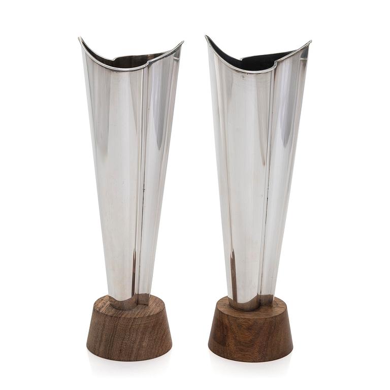 Tapio Wirkkala, two silver and teak 'Flame' vases, Kultakeskus, Hämeenlinna 1962 and 1964.
