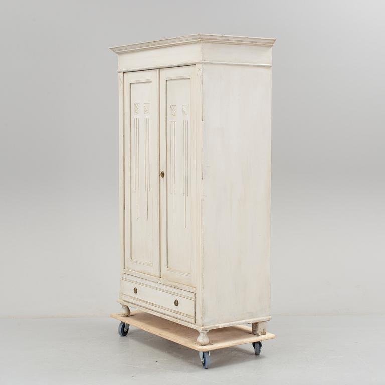 A wardrobe, circa 1900.