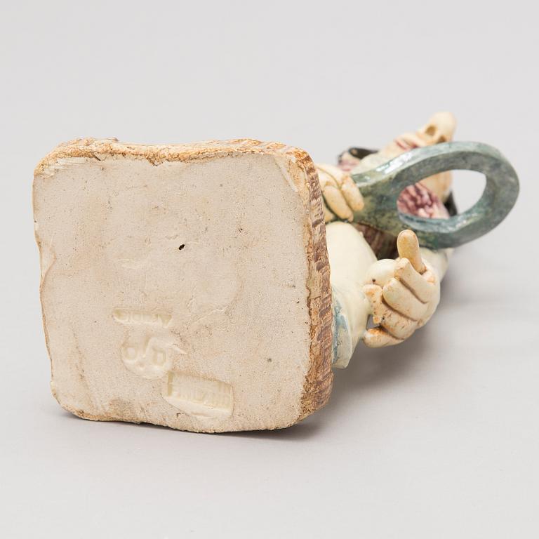 A 1930s ceramic sculpture signed Aja Arabia, Made in Finland.