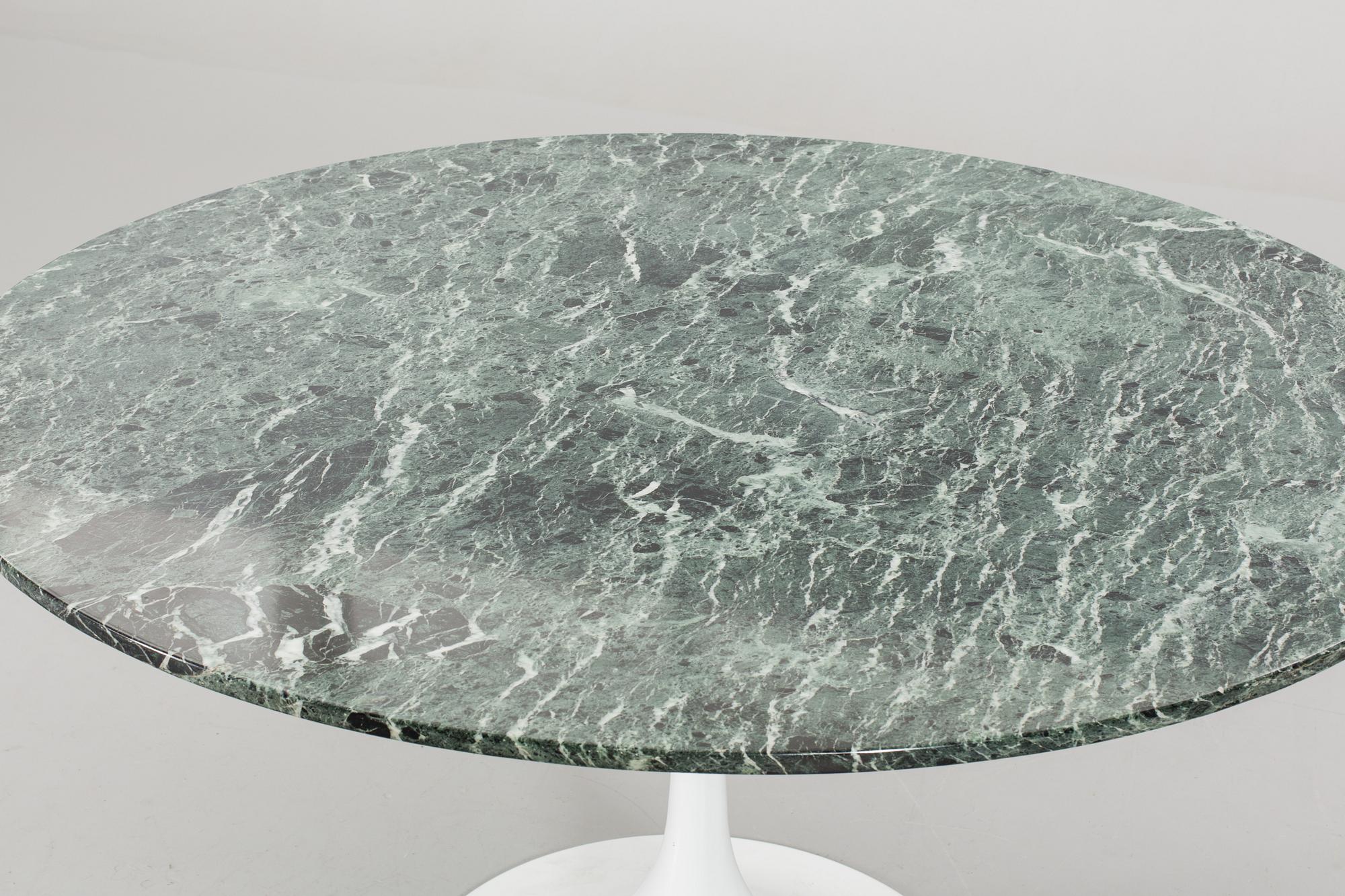 A PASTOE MARBLE TOP DINNER TABLE, 1970/80's.