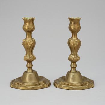A pair of Swedish Rococo "argent haché" candlesticks by C.  C. Liendenberg, Stockholm 1767.