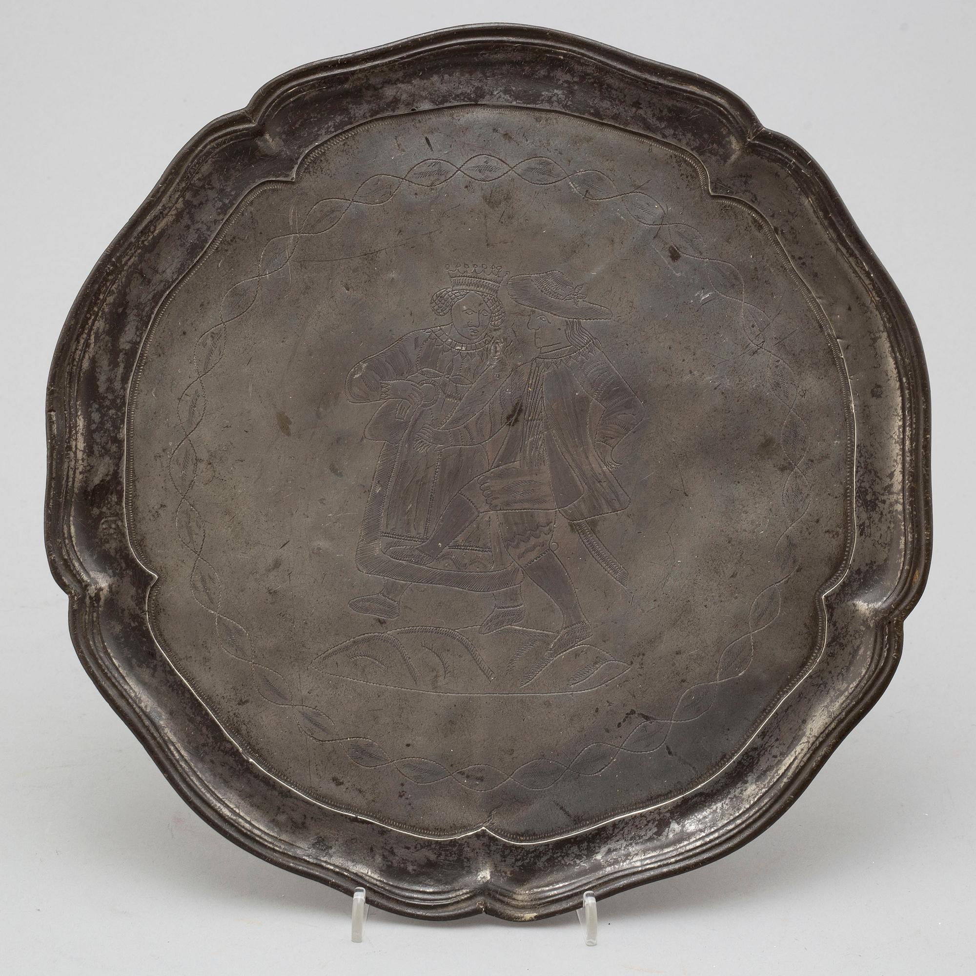 A GERMAN PEWTER PLATE, marked 1710.
