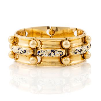 499A. Armband 18K guld med emaljdetaljer.