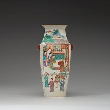 512. A figural famille rose vase, Qing dynasty, 19th century.