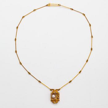 Björn Weckström, "Magic pearl", an 14K gold necklace with a cultured pearl. Lapponia 1972.