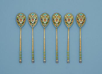 A set of six Russian 19th century silver-gilt and enamle tea-spoons, unidentified makers mark, St. Petersburg.