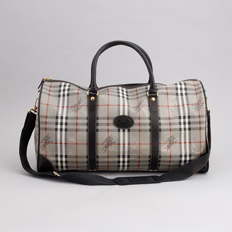 Burberry, a canvas weekend bag.