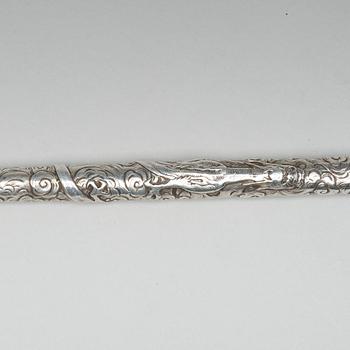 A Japanese silver opium pipe, Meiji period (1868-1912).