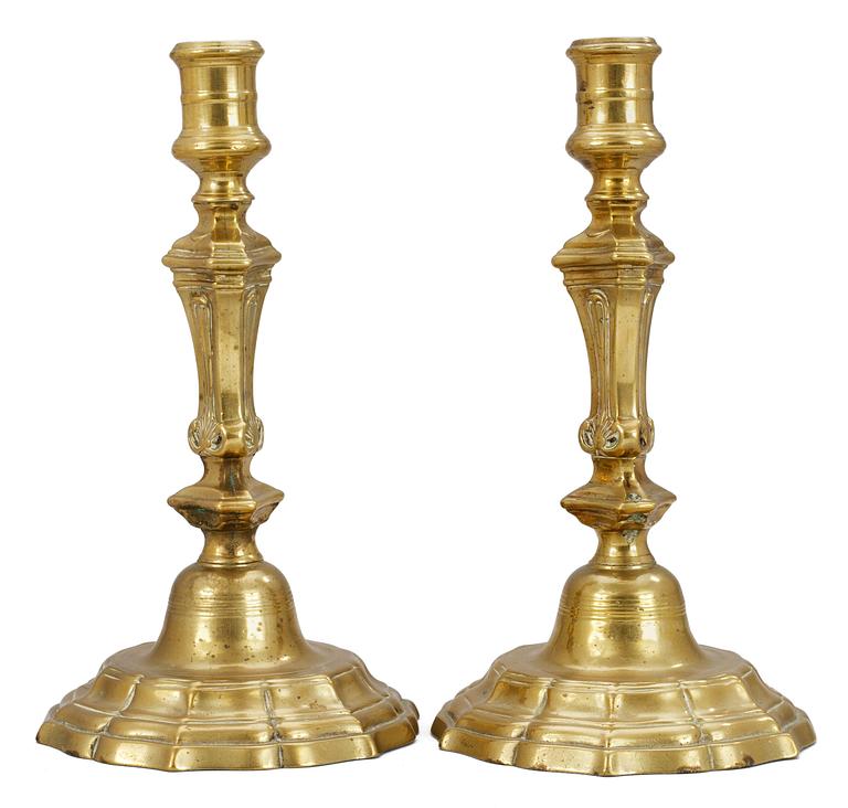 A pair of French 18th cent brass candlesticks.