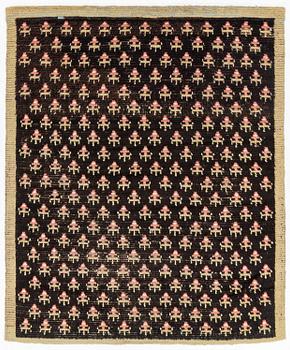 A knotted pile rug, Sweden/Finland, 18th/19th Century, c. 190 x 158 cm.