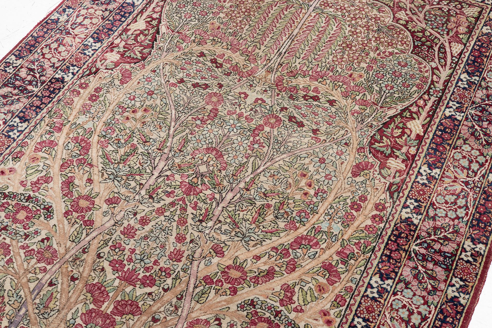 An antique Kirman rug, south Persia, c. 220 x 140 cm.