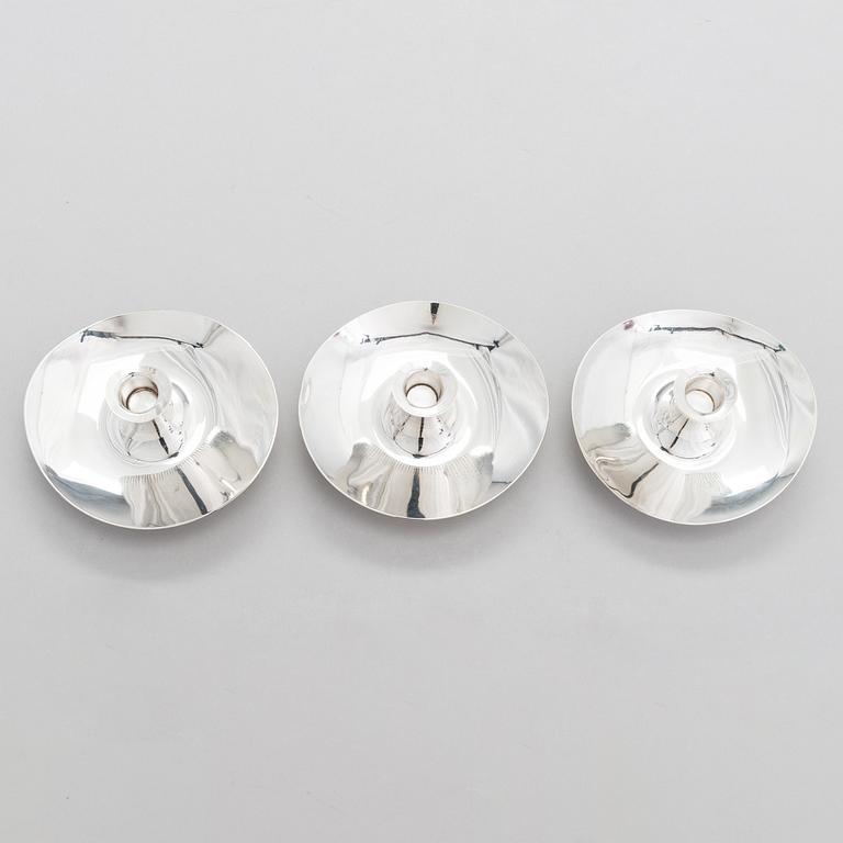 TAPIO WIRKKALA, Three silver candlesticks, Hopeatehdas Oy, Helsinki 1957-65.