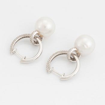 Pearl and brilliant cut diamond earrings.