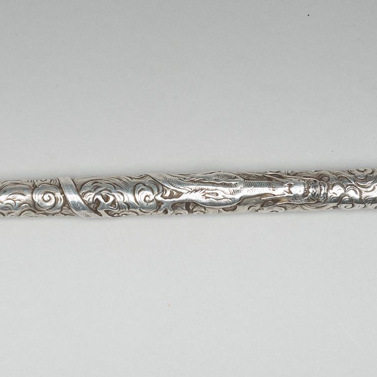 A Japanese silver opium pipe, Meiji period (1868-1912).