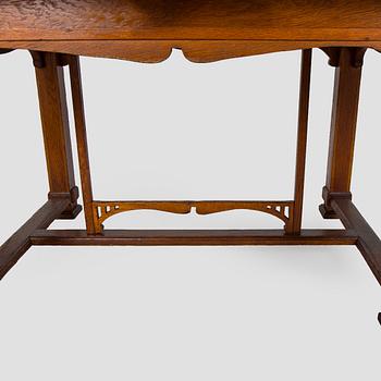 Dining table and six chairs, early 1900.