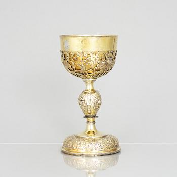 A 17th century silver-gilt cup, marked GM.