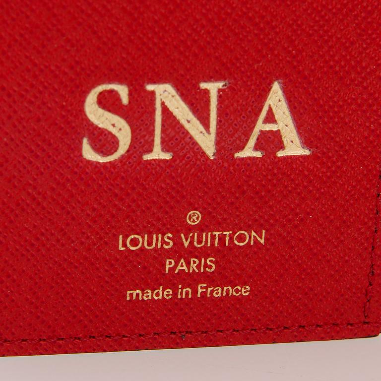 Louis Vuitton, A Monogram canvas Notebook cover 'Paul'.