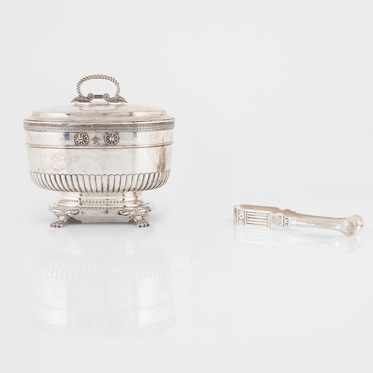 A Swedish 19th century silver sugerbowl, mark of Gustaf Möllenborg, Stockholm 1826, silver sugar tong, mark L.Boye, 1779.